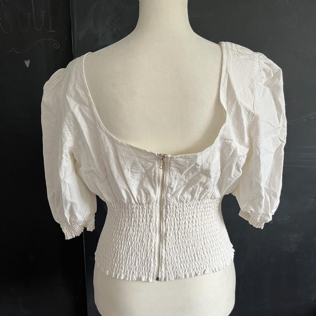 White puff sleeve top. Slightly cropped. Zip closure... - Depop