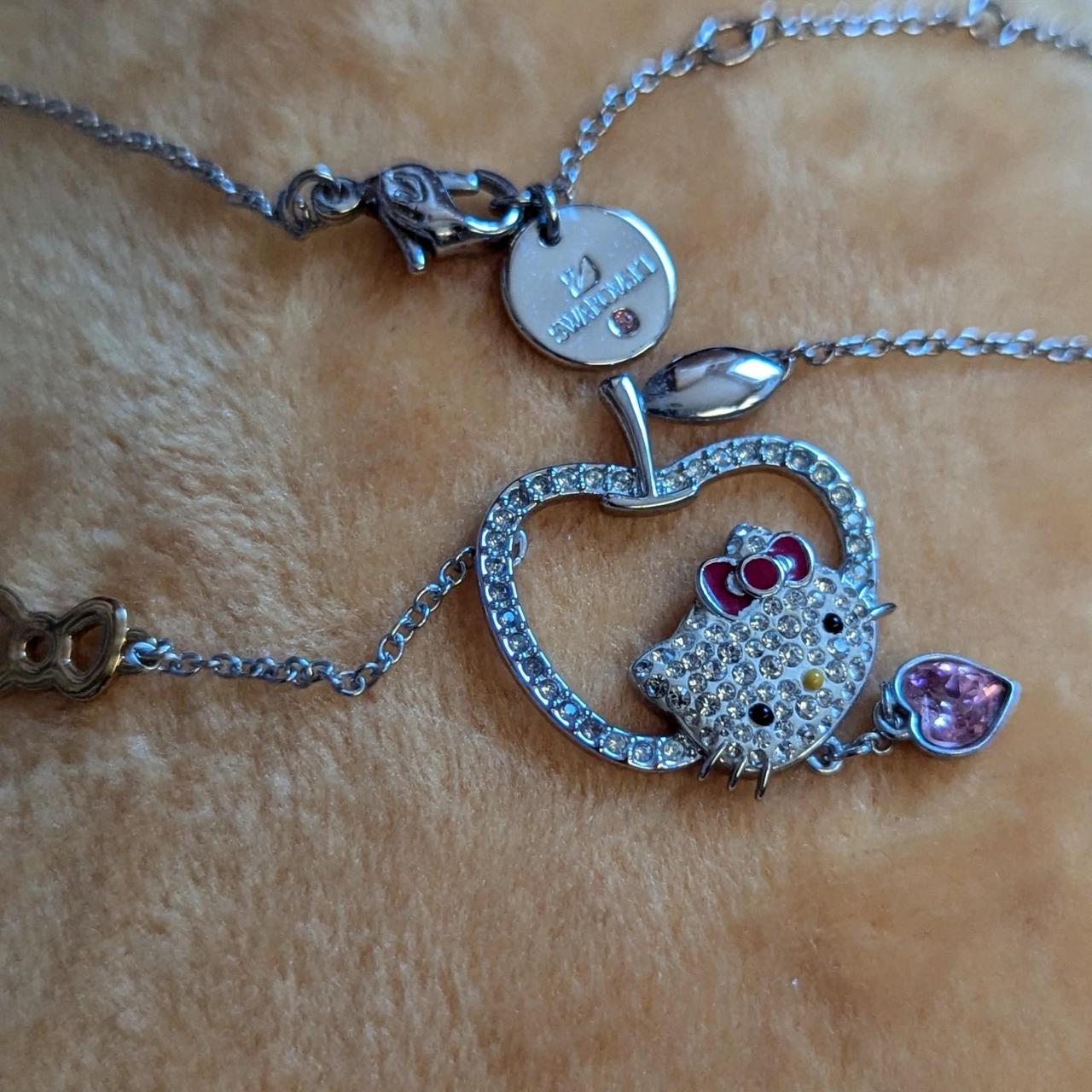 hello kitty x swarovski necklace Apple charm 🍎 | Depop