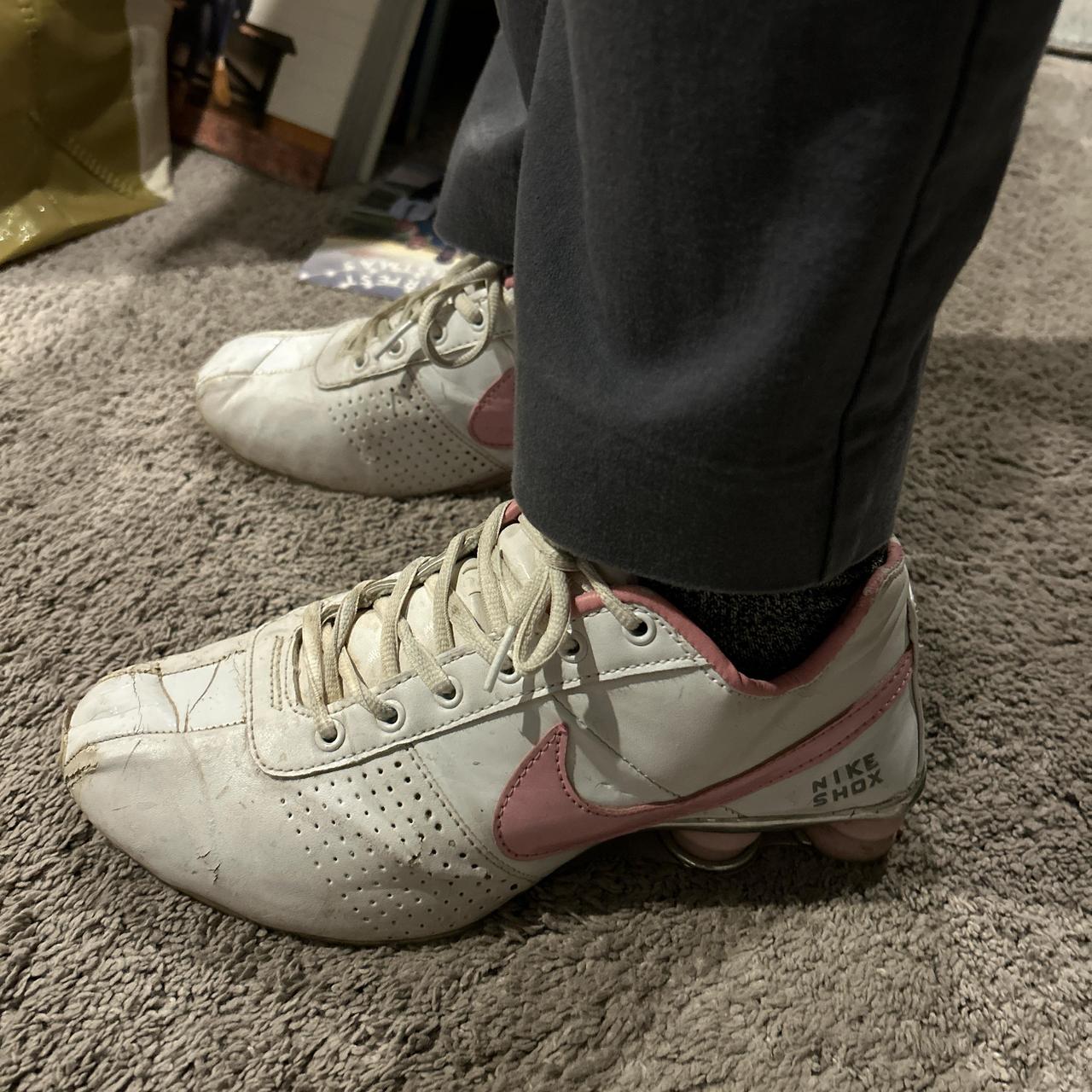 white and pink nike shox