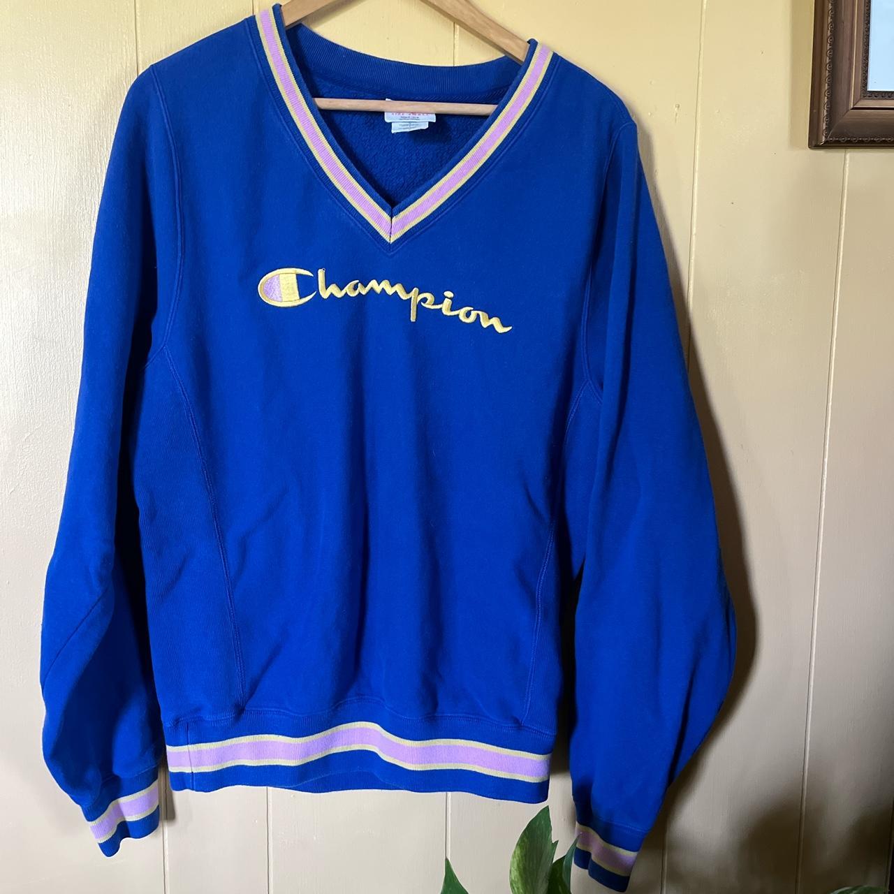 Champion embroidered outlet sweater que es