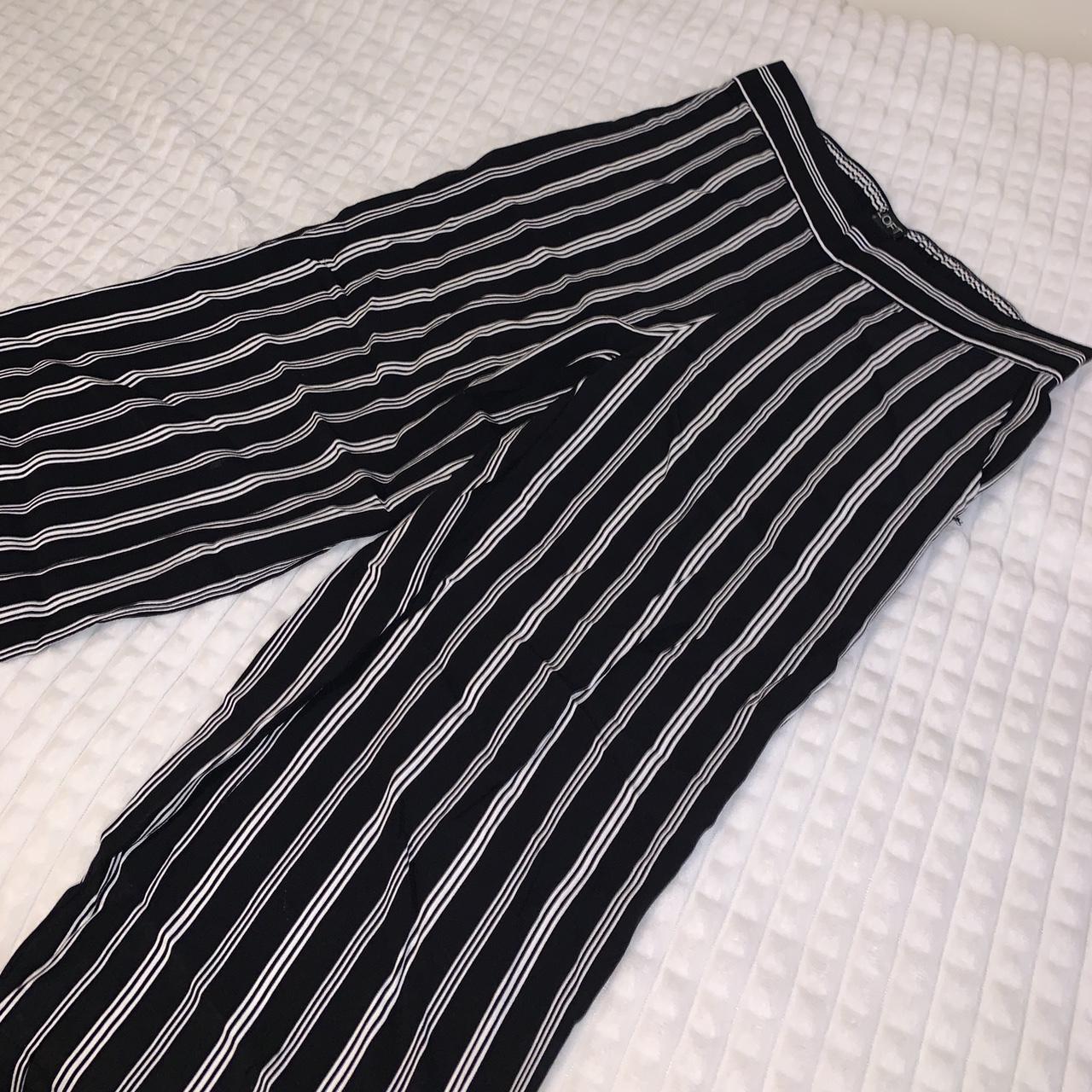 BLACK AND WHITE STRIPED FLOWY PANTS - from Loft -... - Depop