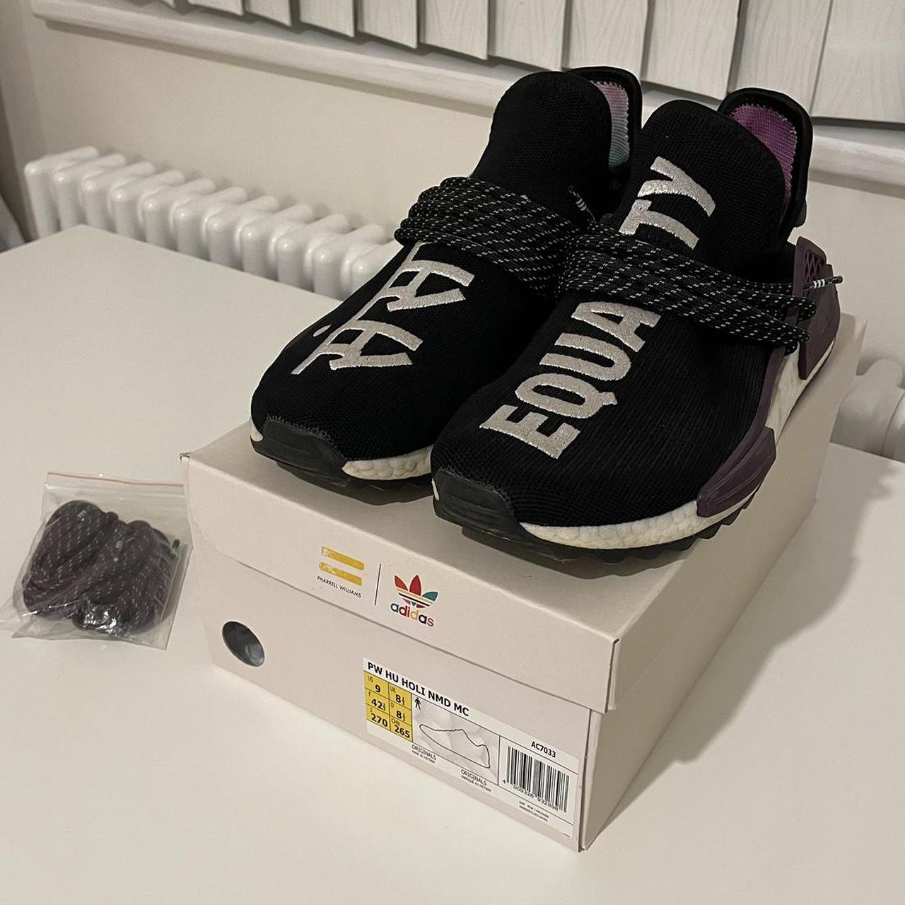 Human race trainers on sale black