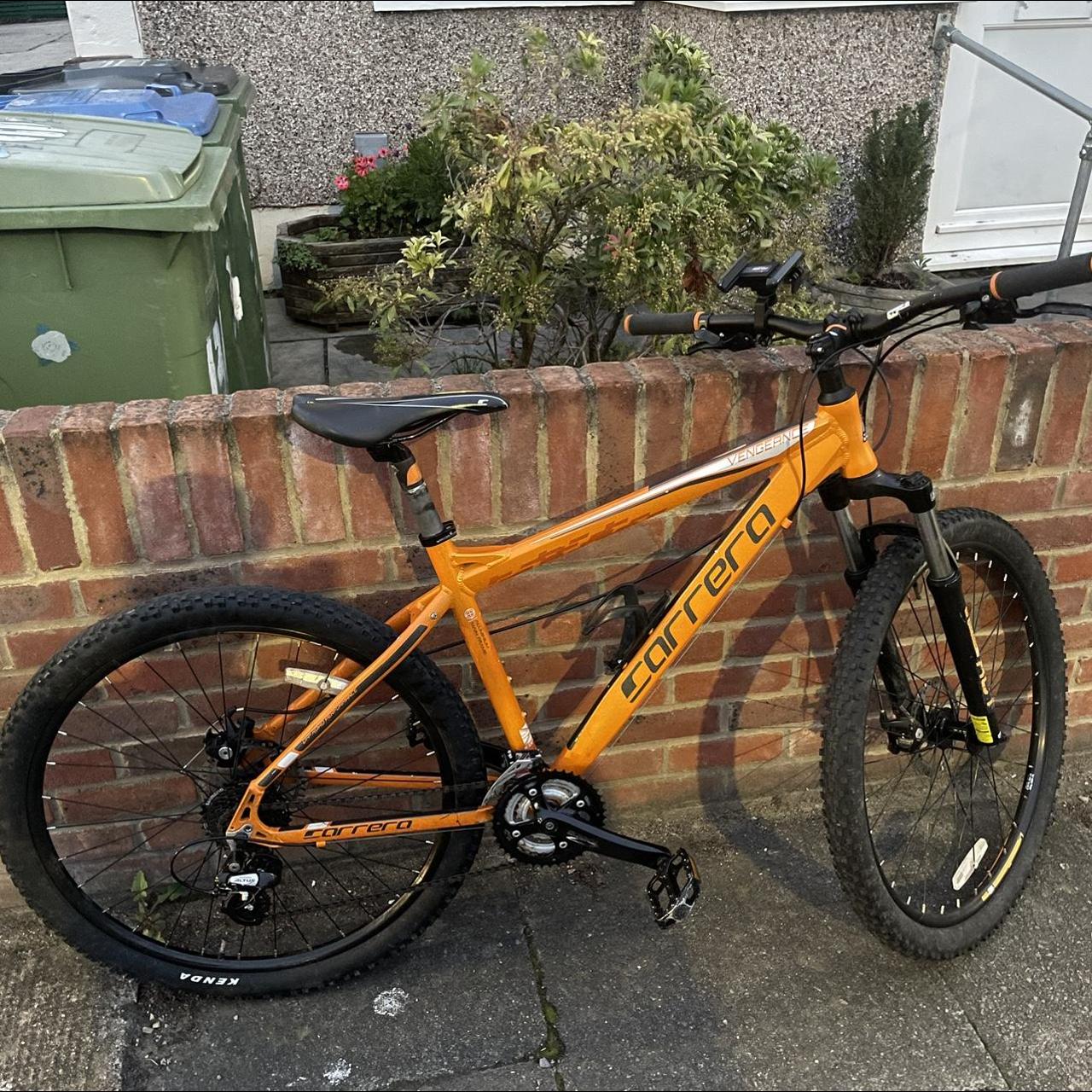 Carrera bike orange online