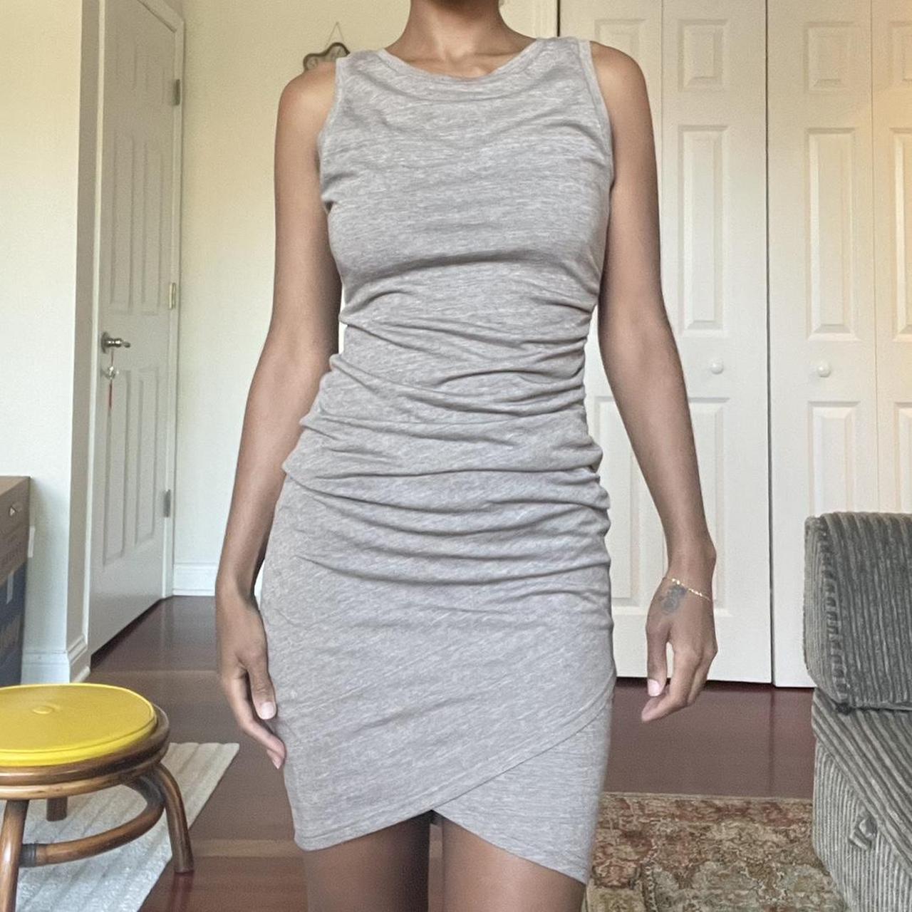 Grey stretchy dress with a ruched side detail. Depop