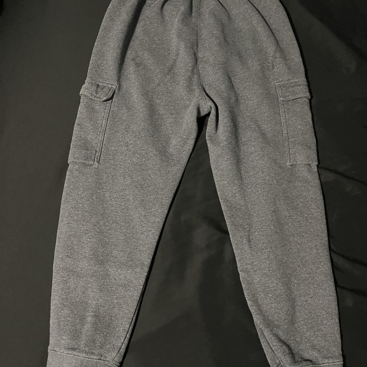 nike joggers with pockets on the side