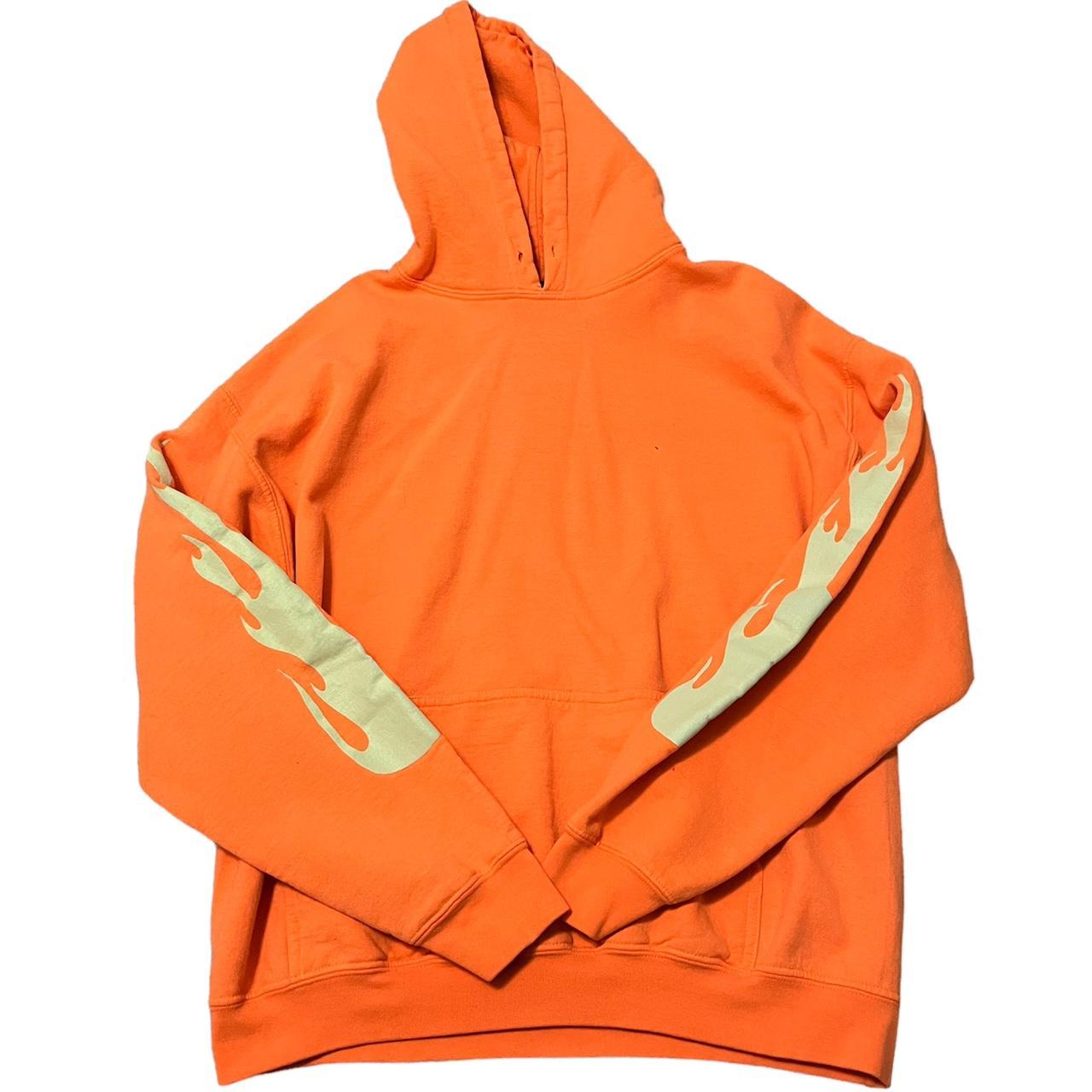 kylie jenner orange hoodie with flame details on