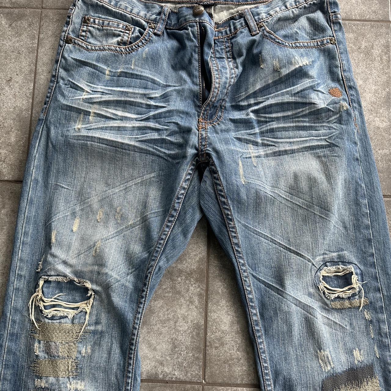 vintage distressed Antique Rivet jeans with patches... Depop