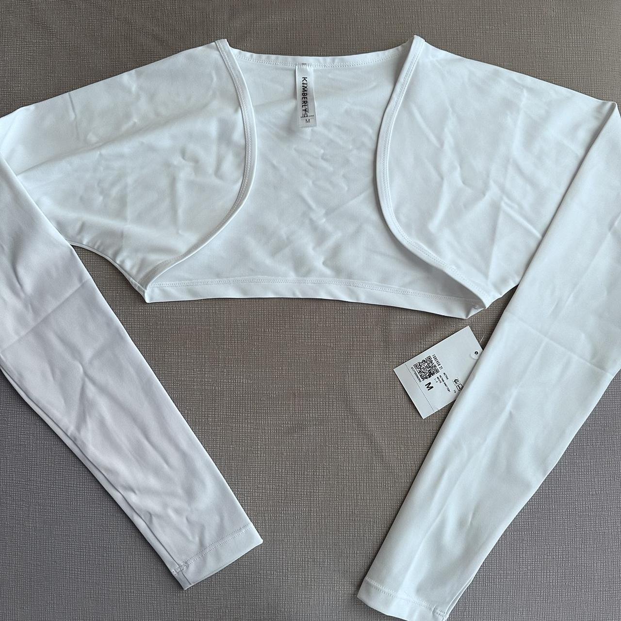 White athletic shrug •brand new with tag •size... Depop