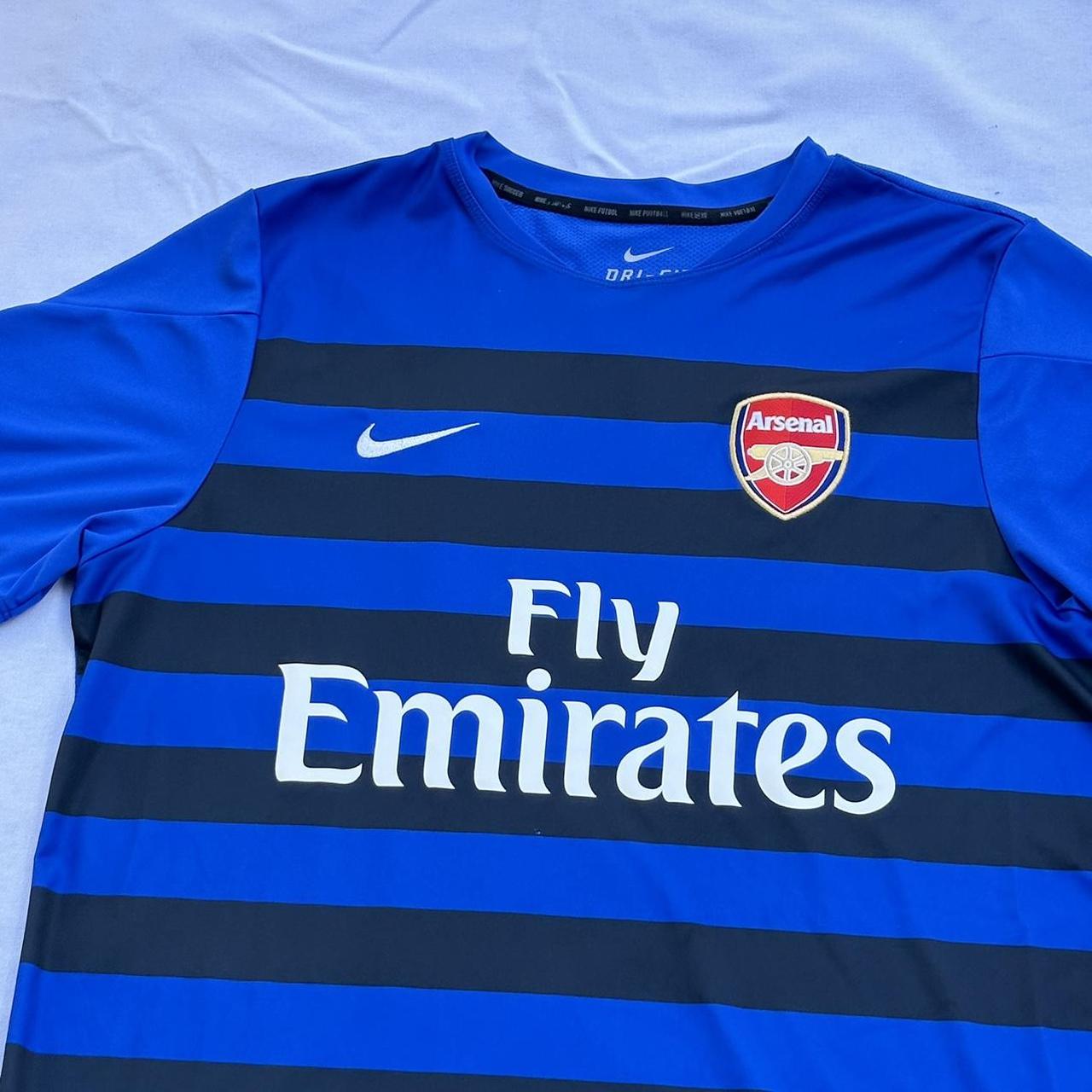 Nike Arsenal blue & black stripe football jersey... Depop