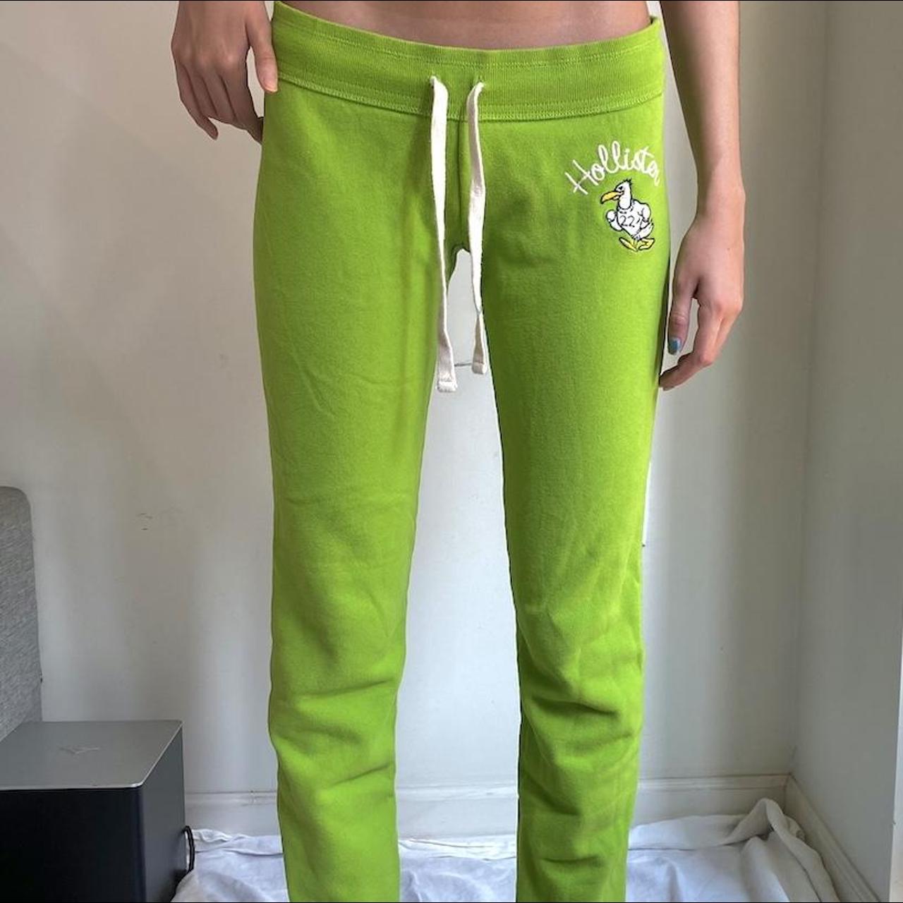 Bright green hollister sweatpants with cute duck - Depop