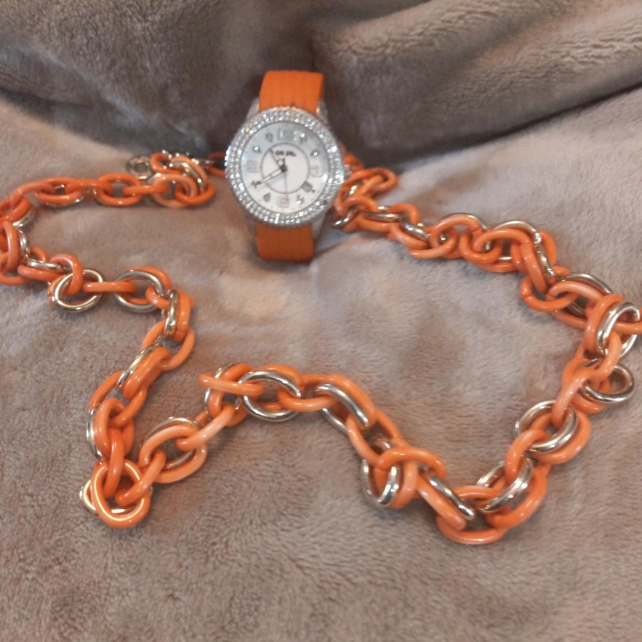 Orange and swarovski folli follie watch with Depop