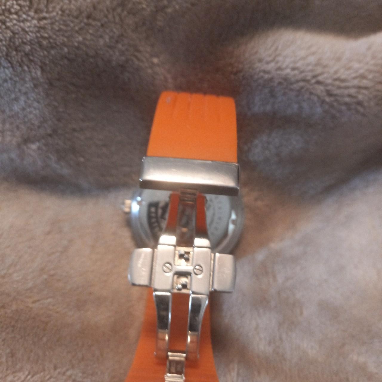 Orange and swarovski folli follie watch with Depop