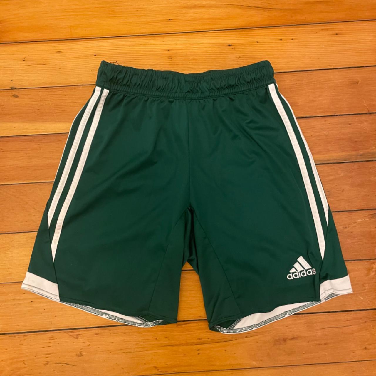 dark green adidas soccer shorts size small (fits... Depop