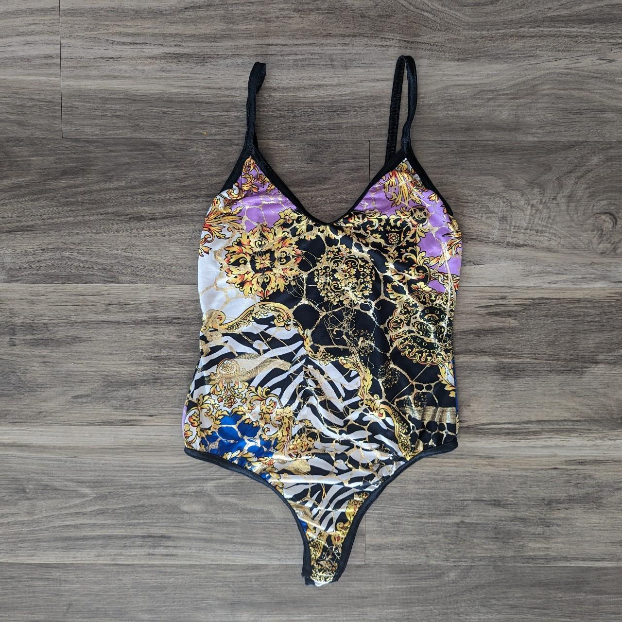 Gold foil animal print thong bodysuit Fabric... - Depop