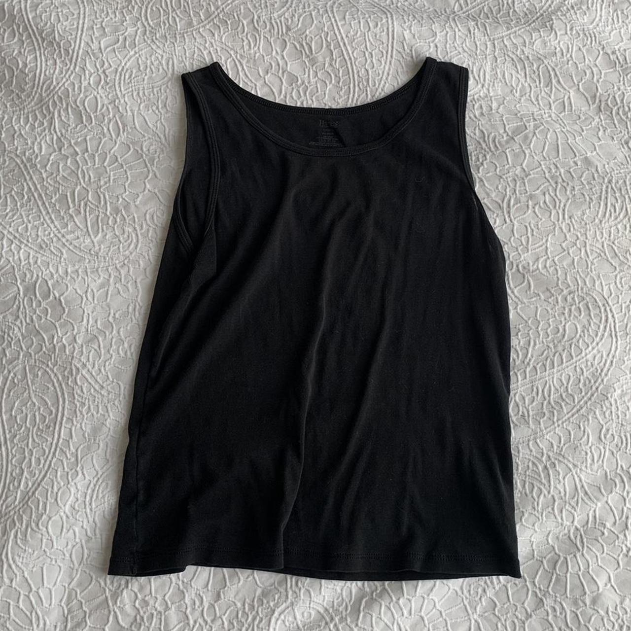 Super cute black Hanes tank top. Size is medium.... - Depop