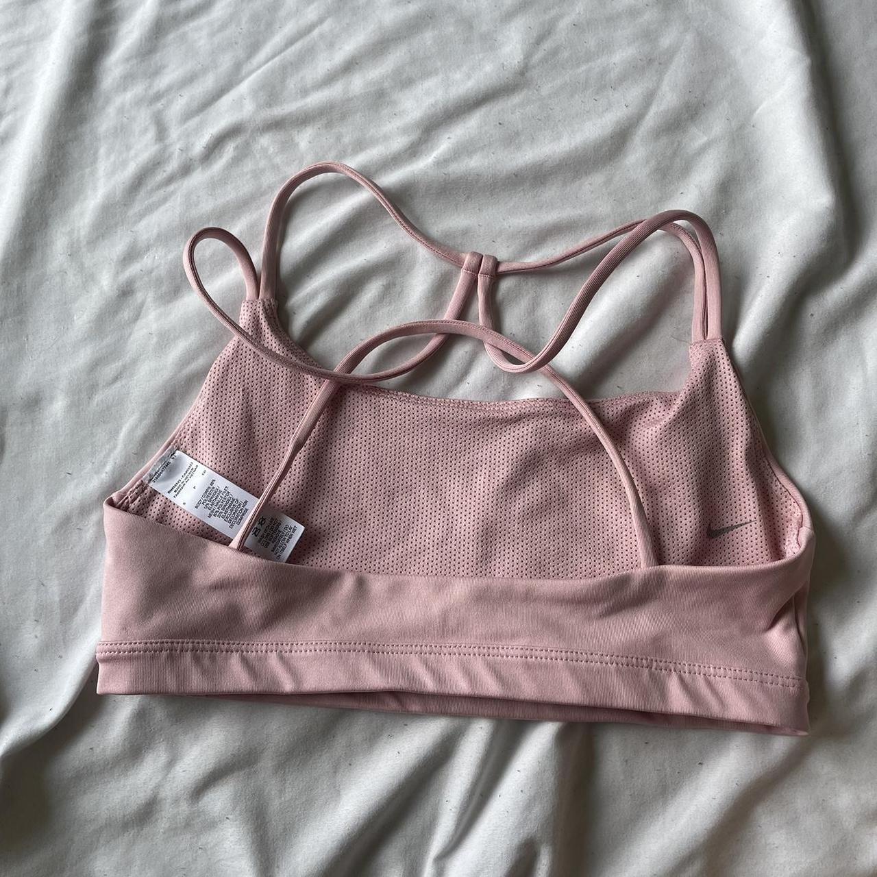 Baby pink Nike sports bra. Criss cross back. Netting... Depop
