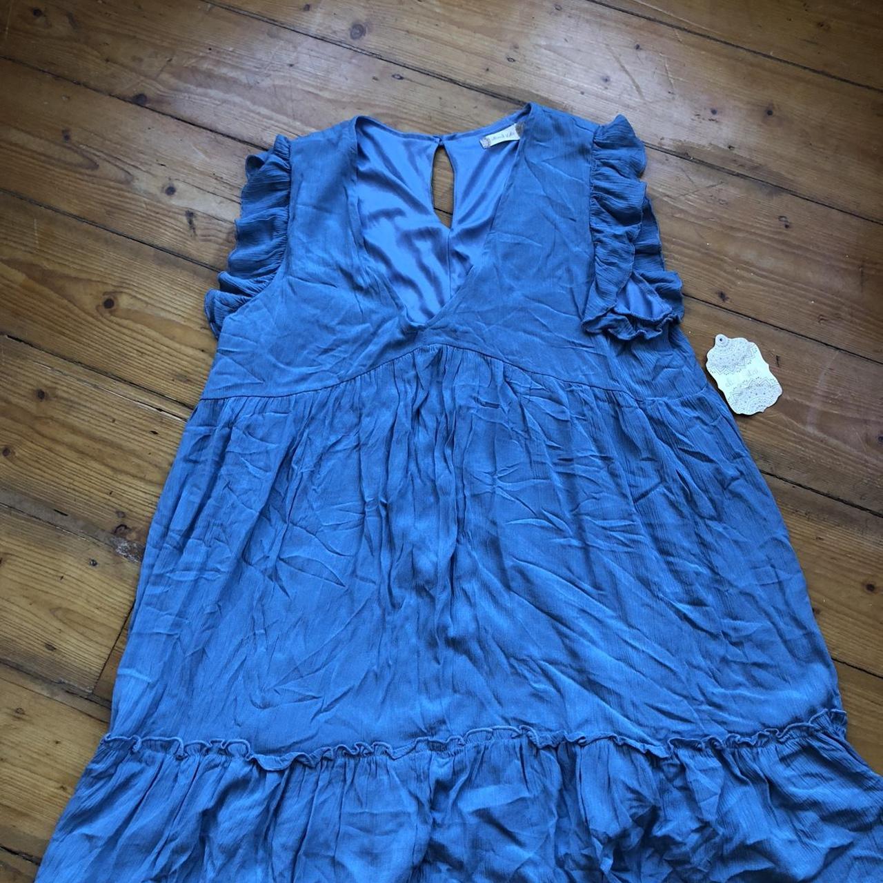 Light blue baby doll mini dress. Ruffles on sleeves.... - Depop