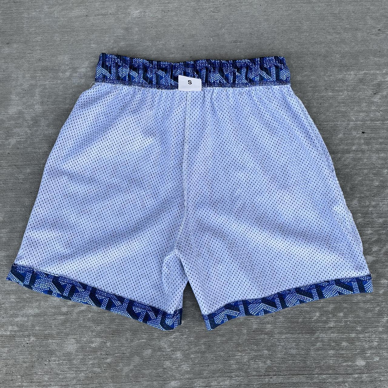 I have this LV bravest studios shorts coming in on - Depop