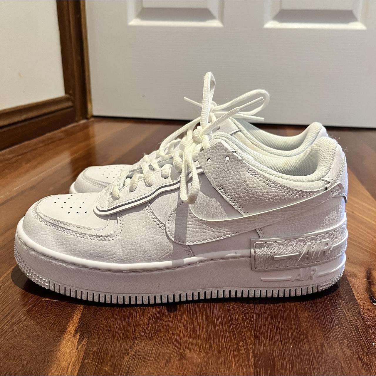 white nike low air forces. size US 9. worn once,... - Depop