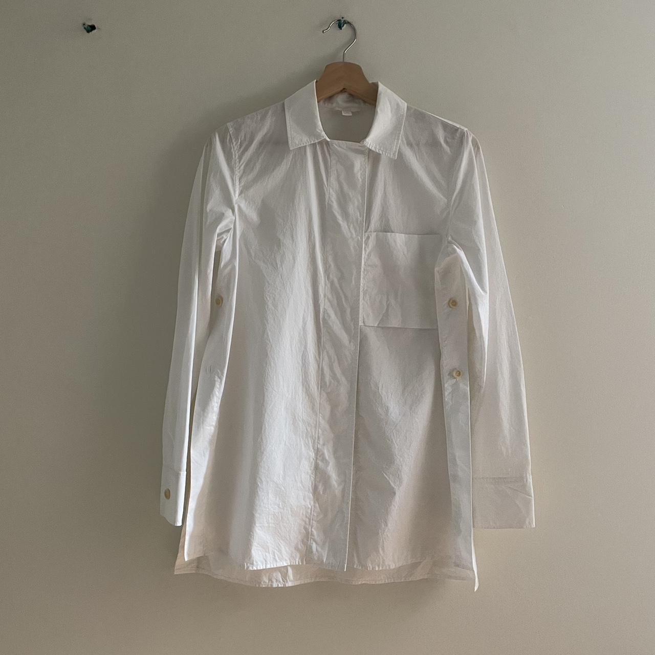 COS white shirt; buttons on the sides between back... - Depop