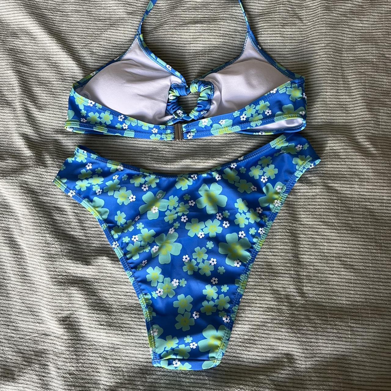 Blue and green floral swimsuit with heart shaped... - Depop