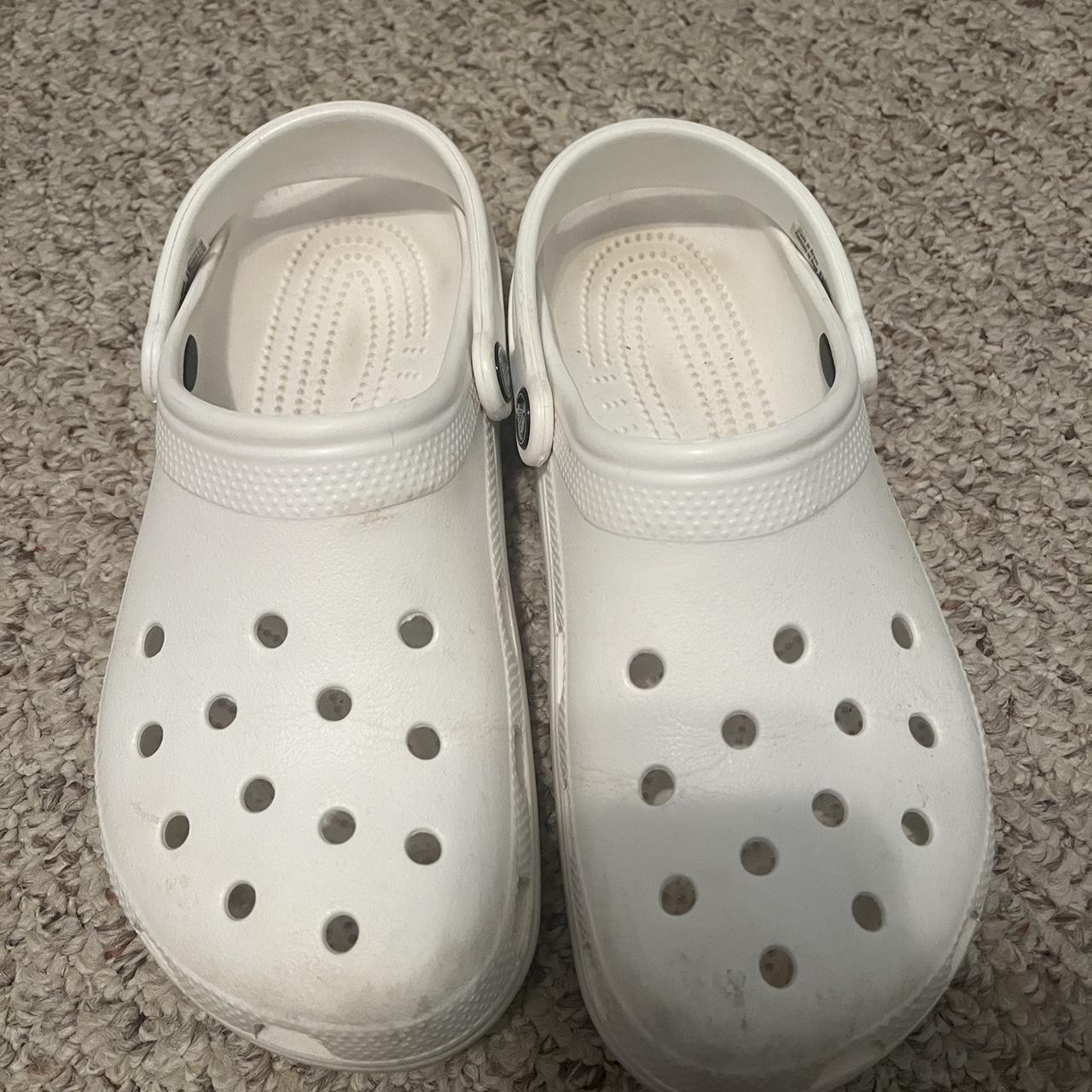 A pair of crocs. They are pretty new I brought them... - Depop