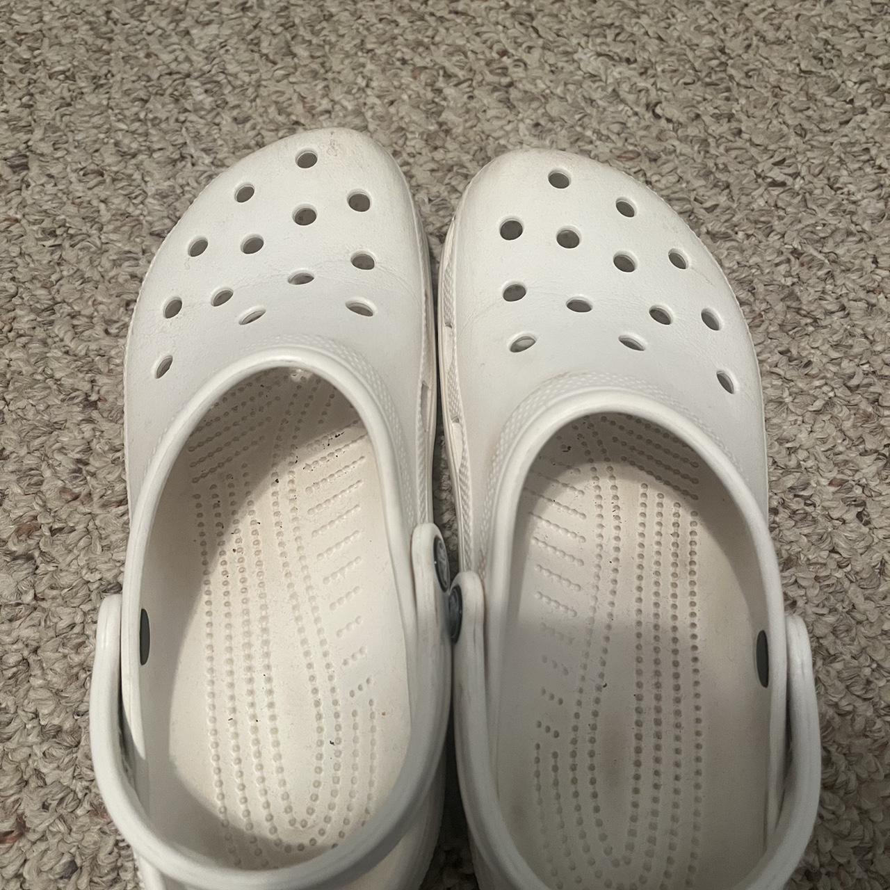 A pair of crocs. They are pretty new I brought them... - Depop