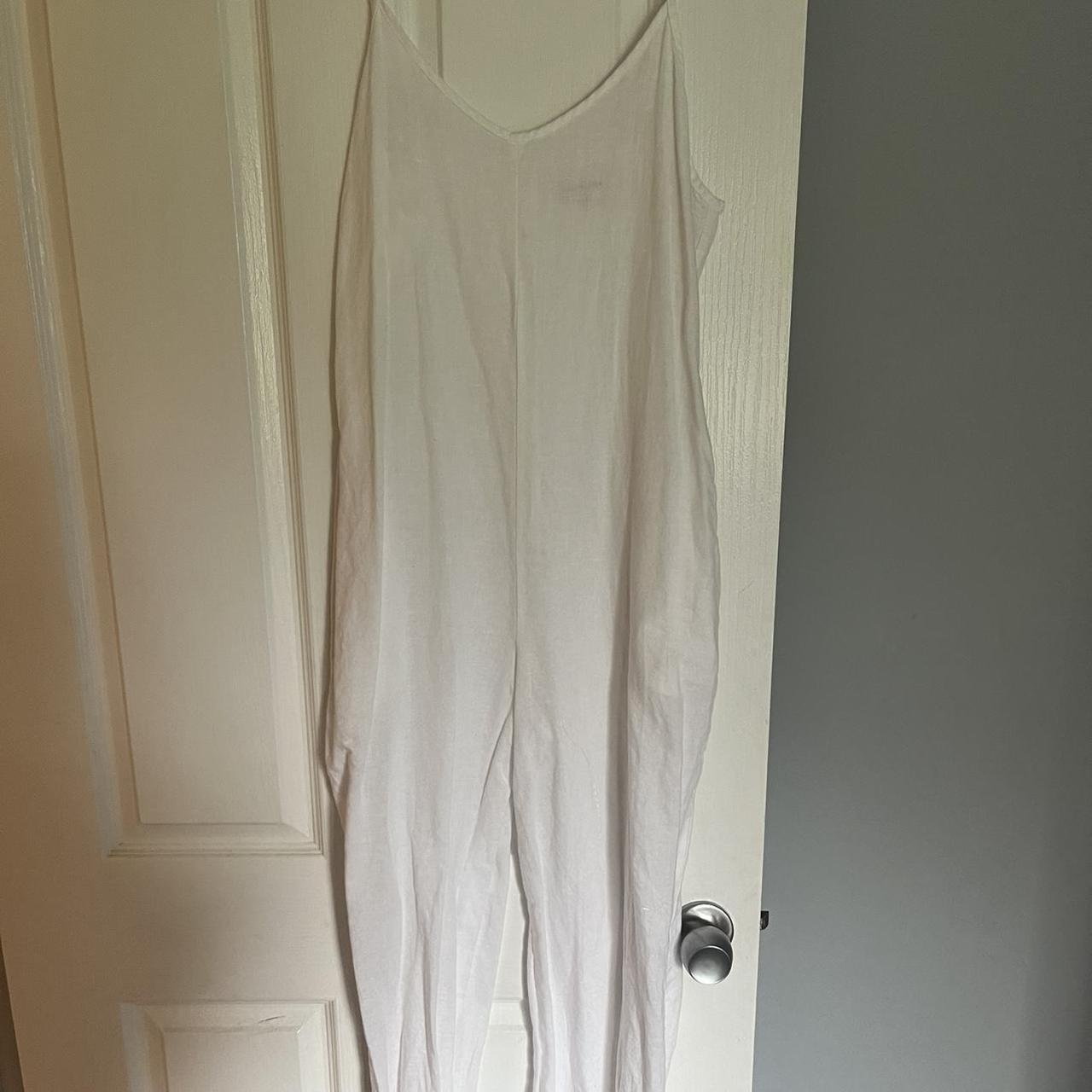 White beach jumpsuit, great for over your swimmers,... - Depop