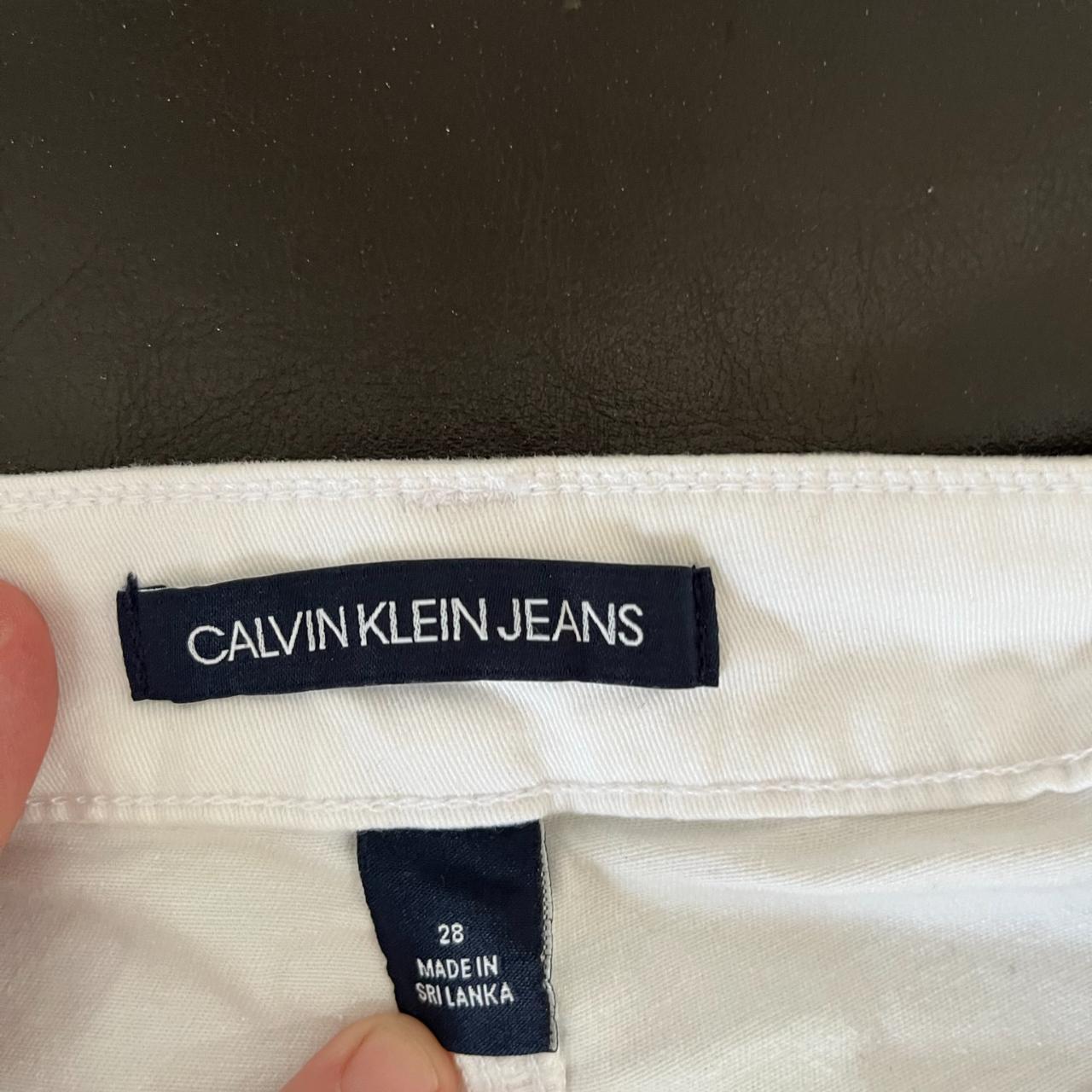 Calvin Klien white shorts. Size 28. Brand new. ... - Depop