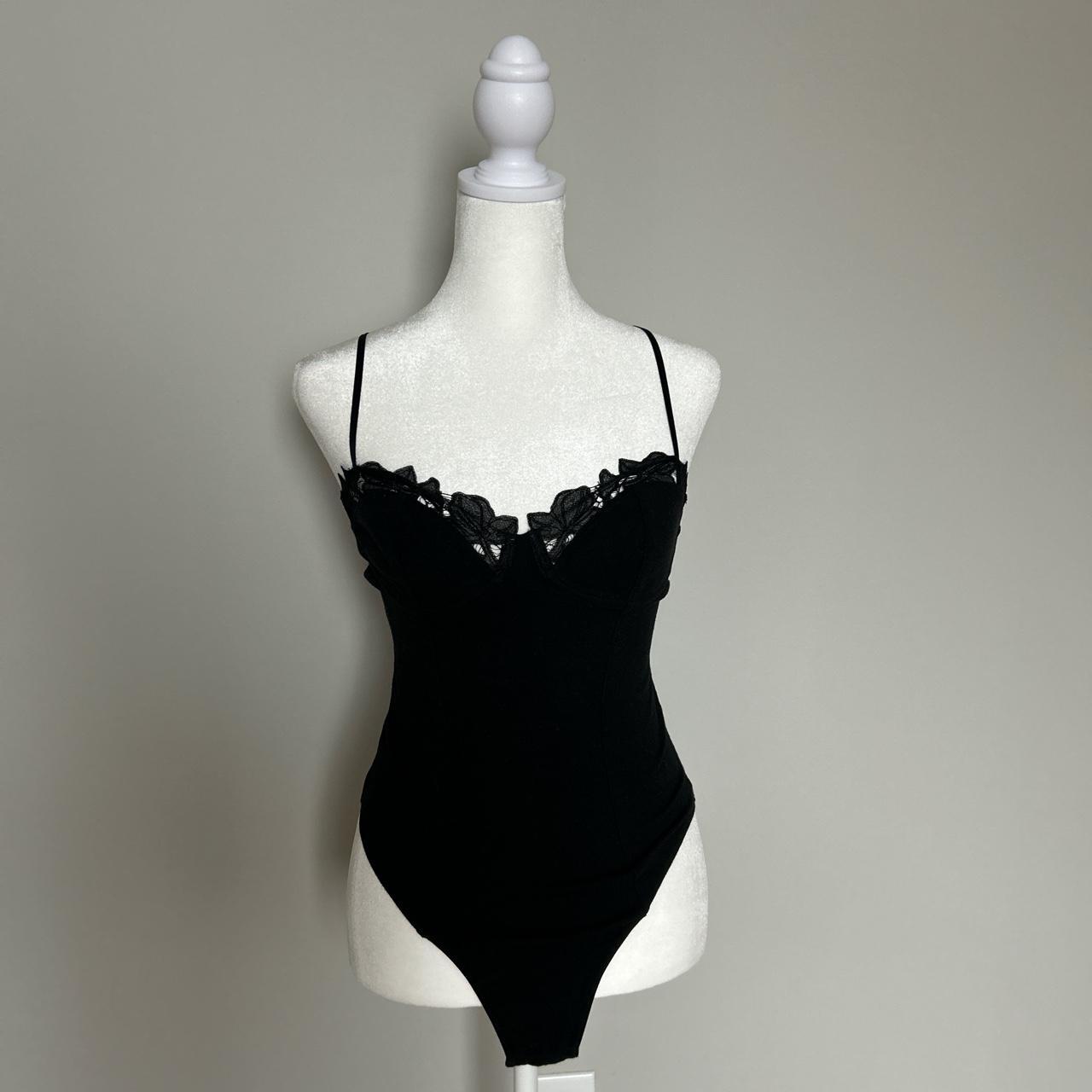 Black bodysuit with adjustable spaghetti straps, cup... - Depop