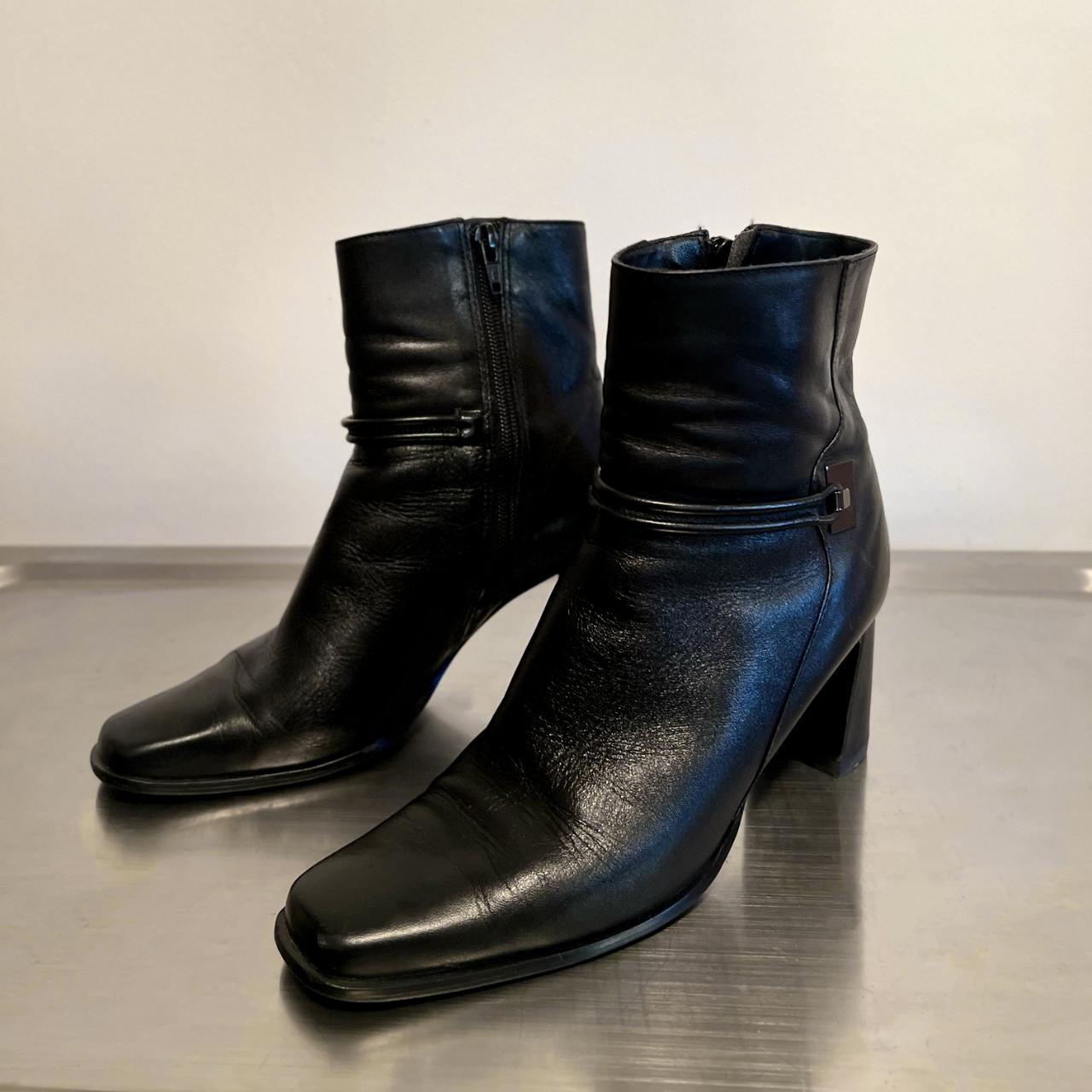 These size 6 1/2 booties showcase a sleek and... - Depop
