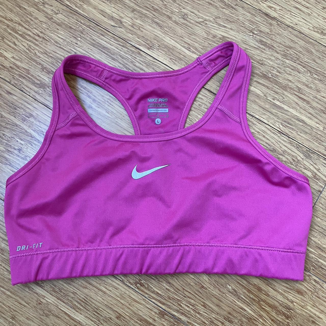 Pink Nike Pro bra size L, great condition - Depop