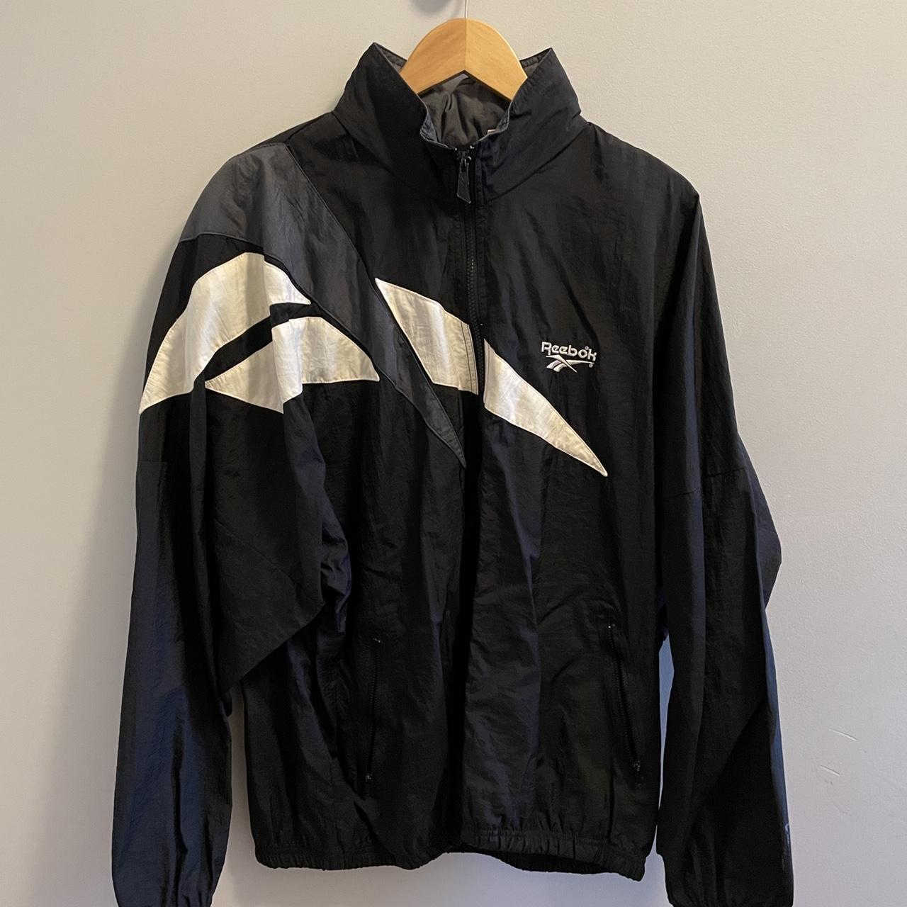 Reebok nylon track jacket in size large. It features... - Depop