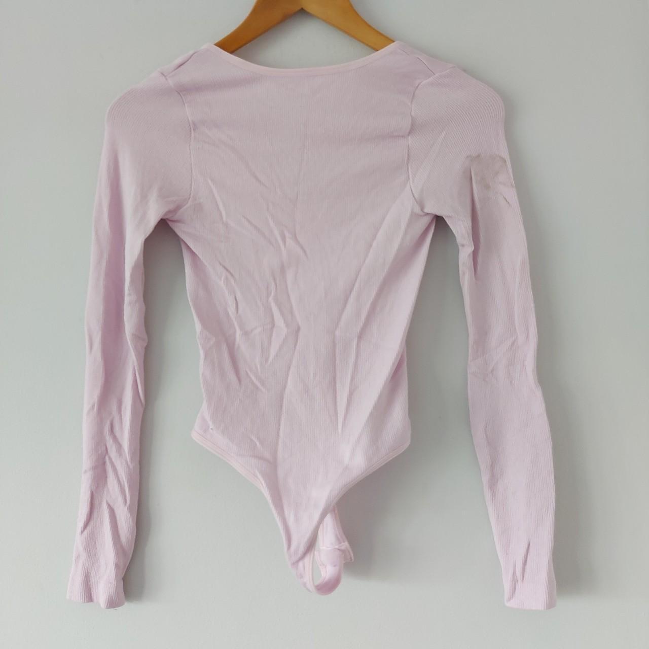 Urban Outfitters light pink v neck long sleeve... - Depop