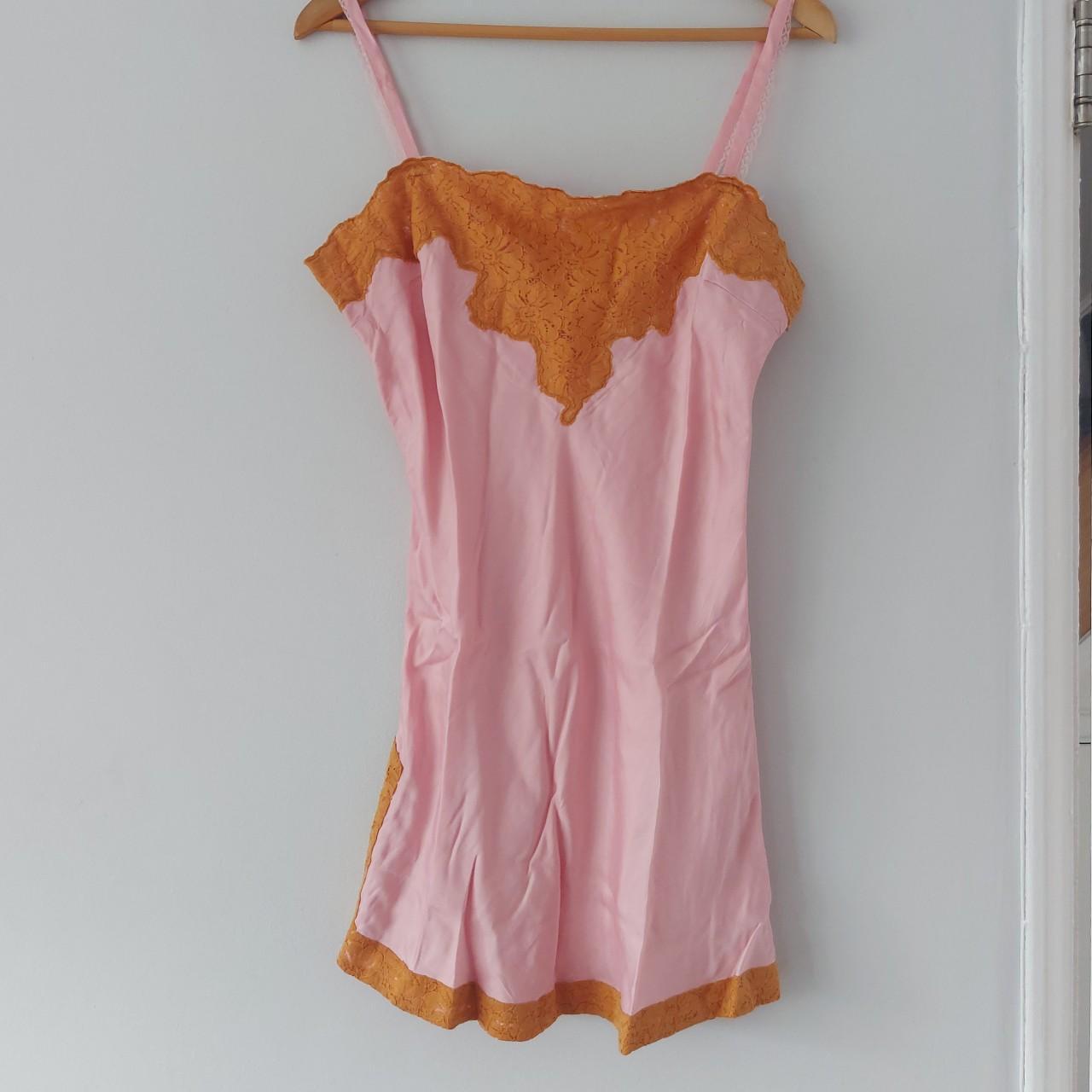 Urban Outfitters Pink Rhiannon mini slip dress. Side... - Depop