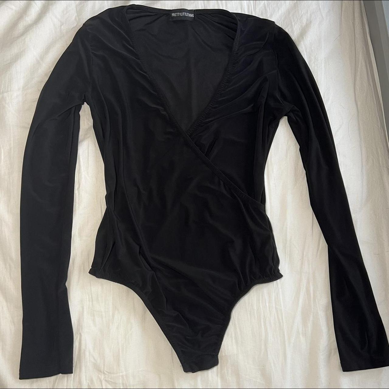 Gorgeous black tight fitting body suit with long... - Depop