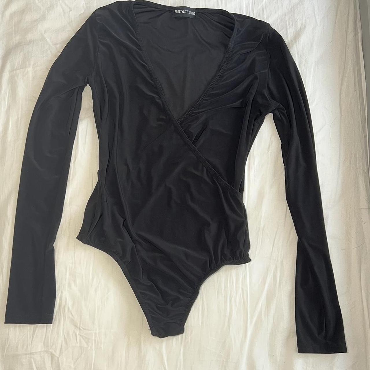 Gorgeous black tight fitting body suit with long... - Depop