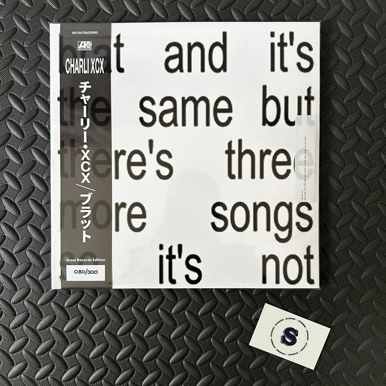 Charli XCX brat and it's the same but there's three... Depop