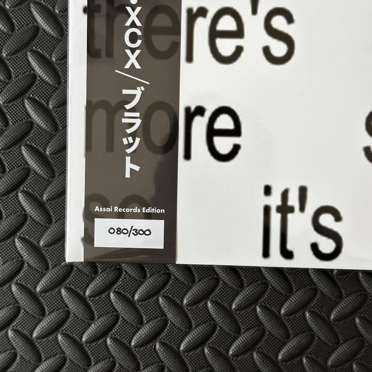 Charli XCX brat and it's the same but there's three... Depop