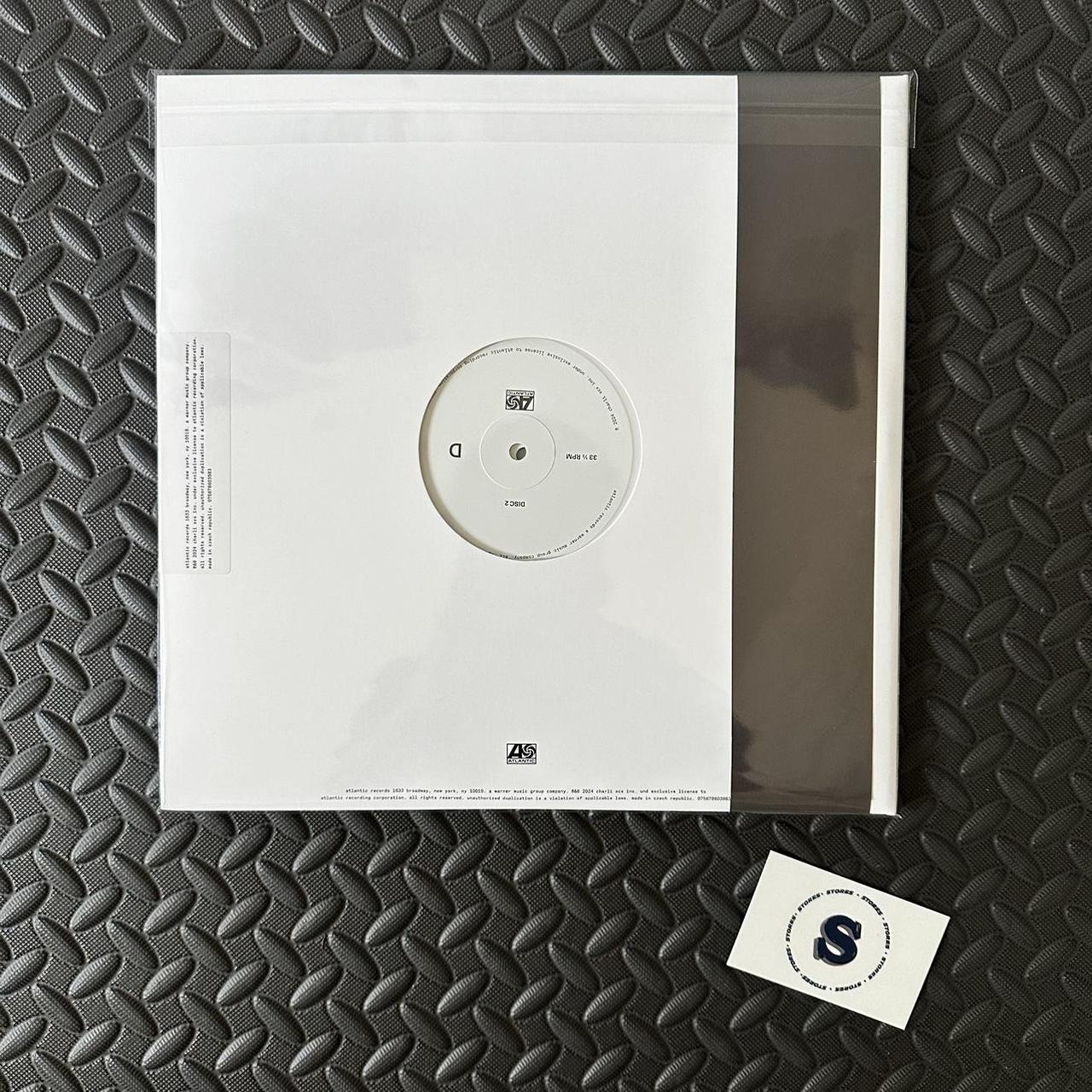 Charli XCX brat and it's the same but there's three... Depop