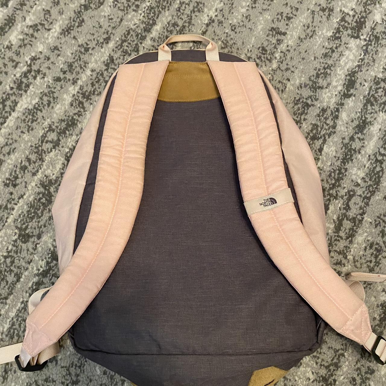 pink North Face backpack - Depop