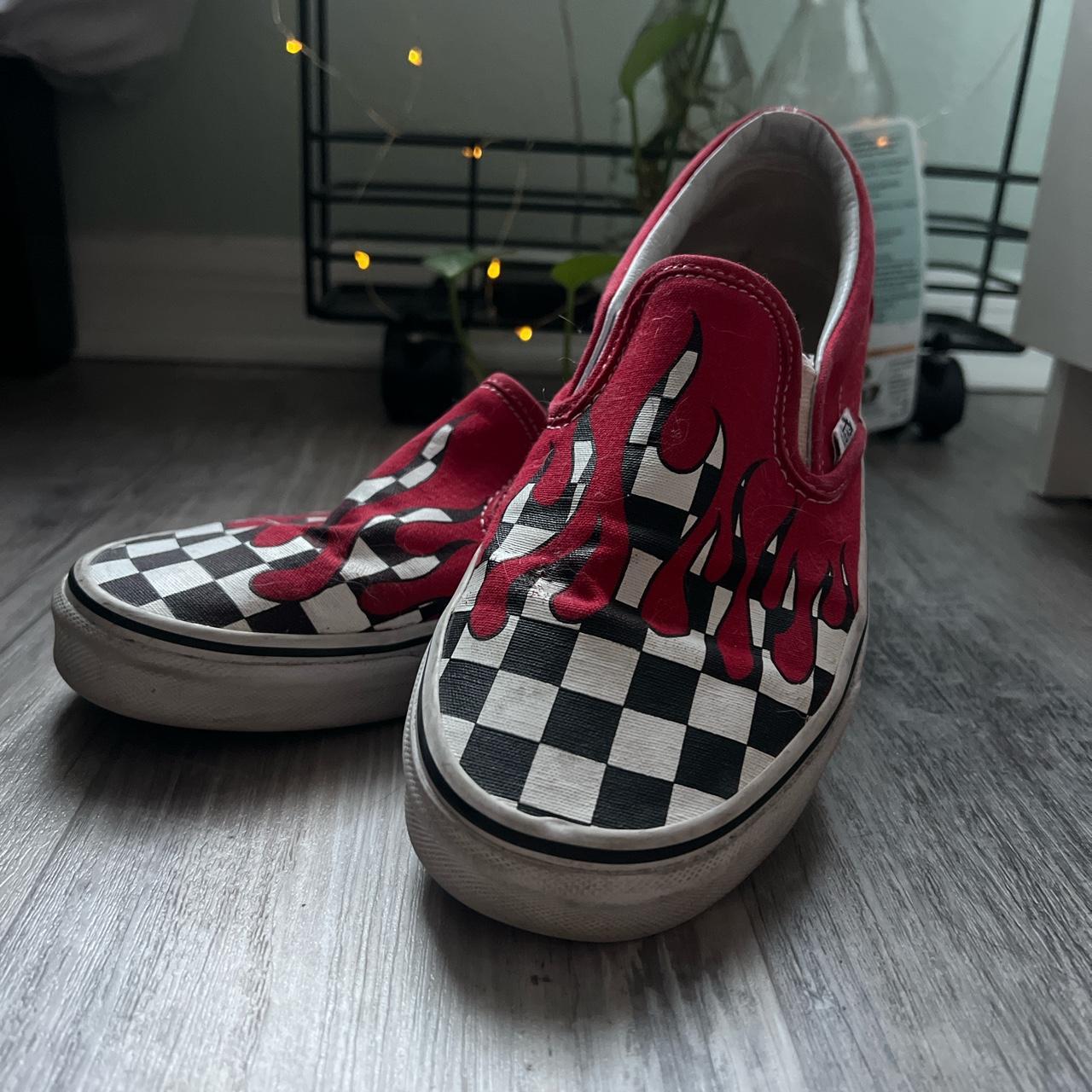 Checkerboard vans shop with red drip