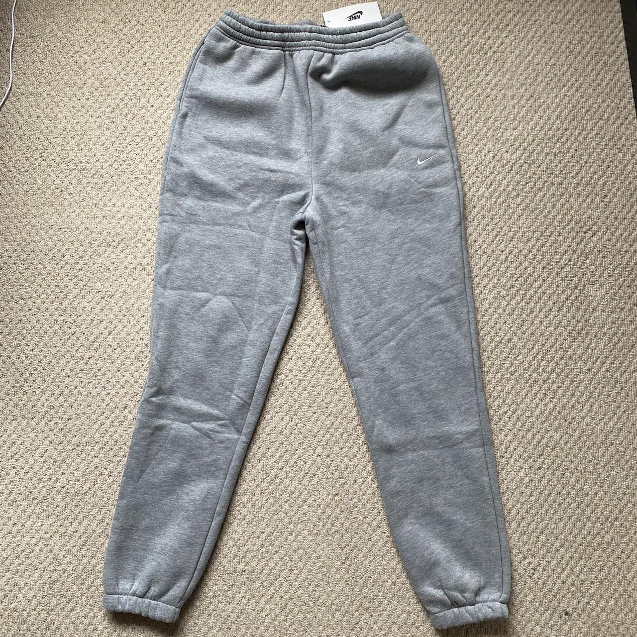 Grey Nike swoosh Joggers thick material brand new... - Depop