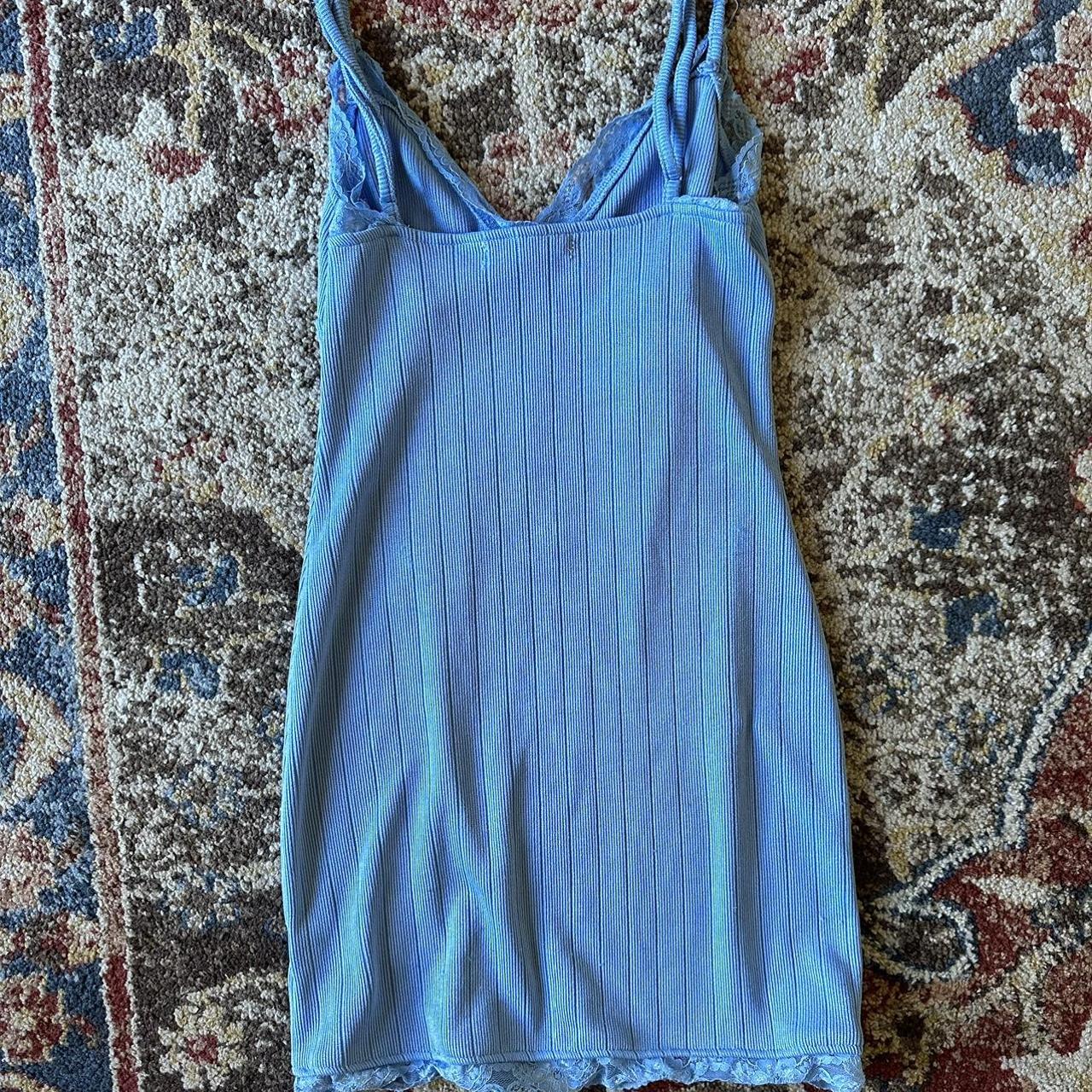 Baby blue dress with lace details. The straps are... - Depop