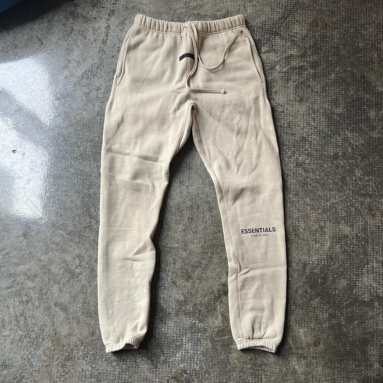 Light khaki Fear of God Essentials sweatpants, too... - Depop