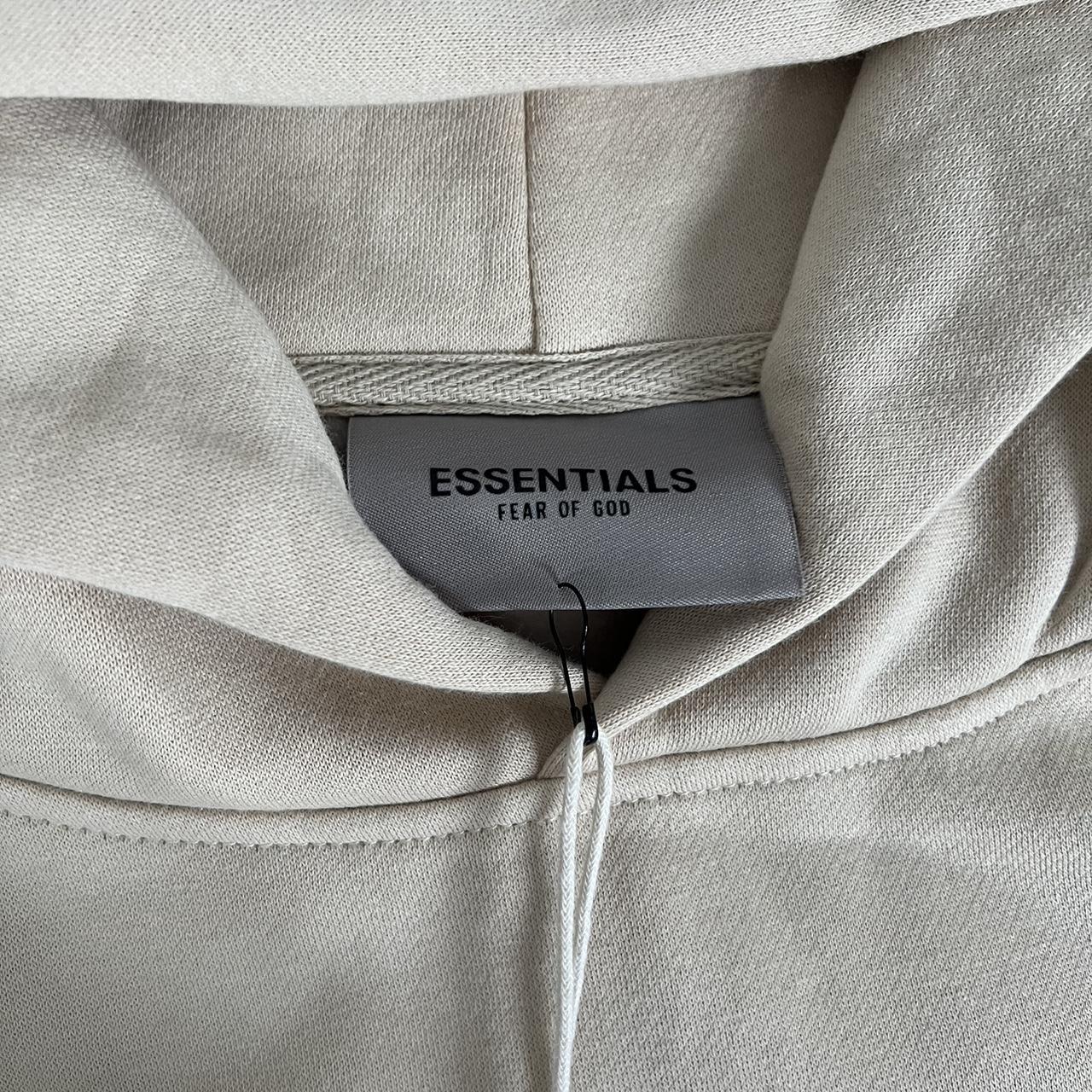 Beige essentials Hoodie is still in perfect... - Depop