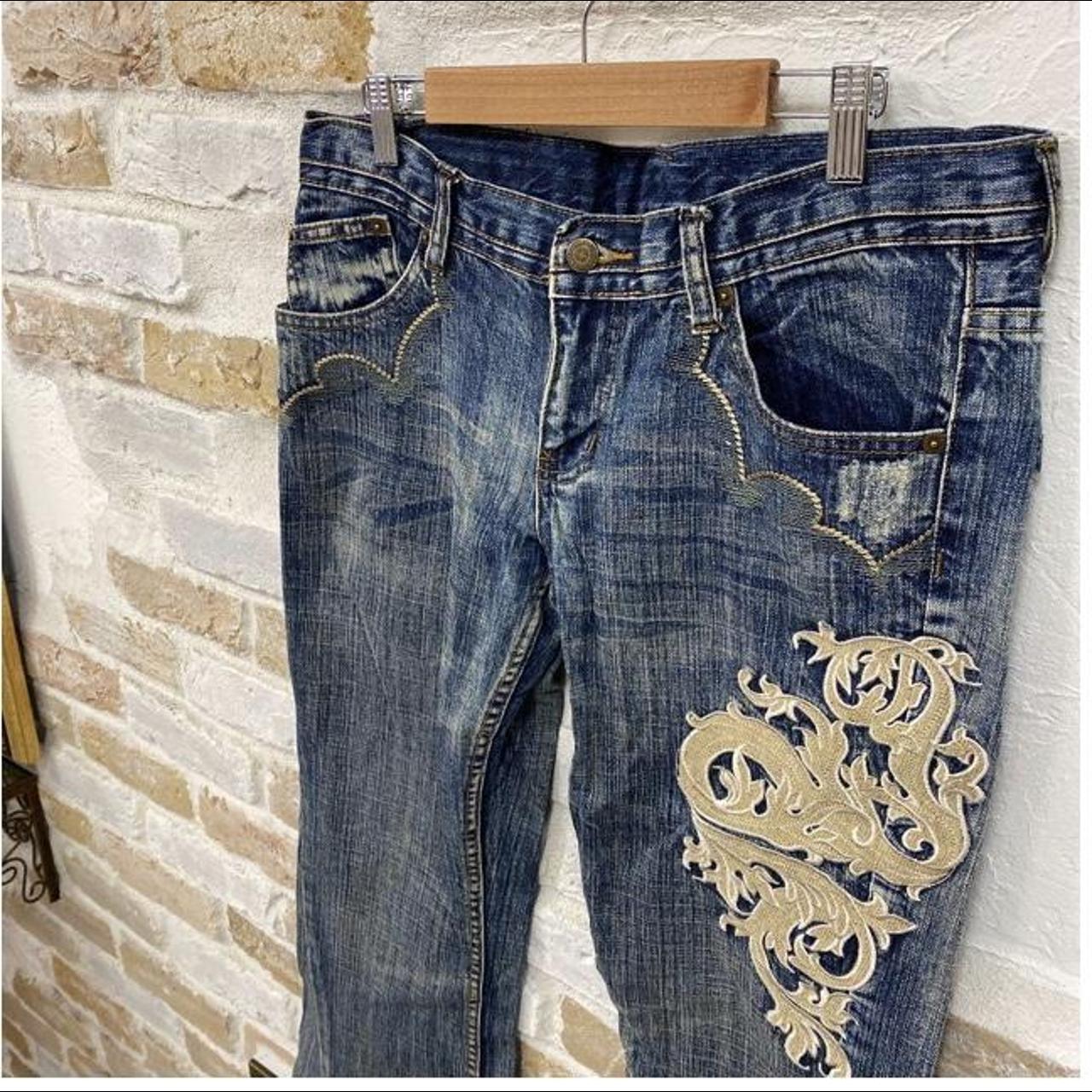 Tornado mart flared jeans with tribal print depop... - Depop