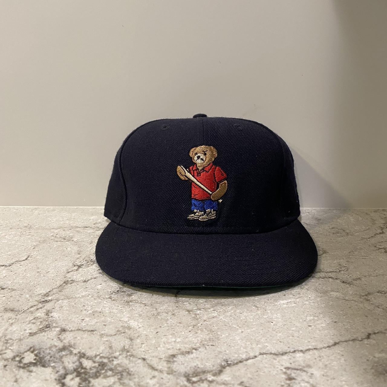 Navy blue fitted hat with a teddy bear on the front,... - Depop