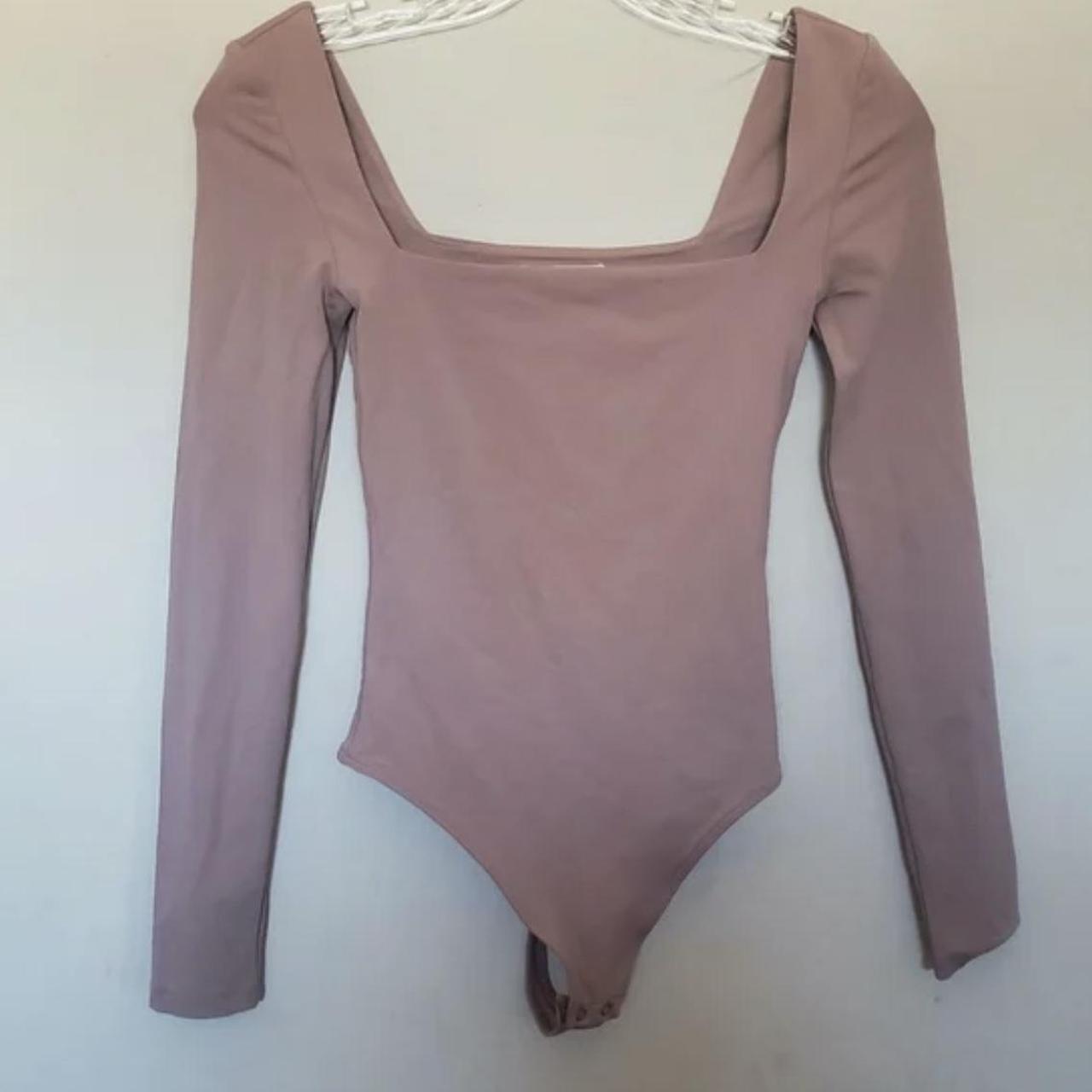 Pink aritzia bodysuit High quality + not worn Size... - Depop