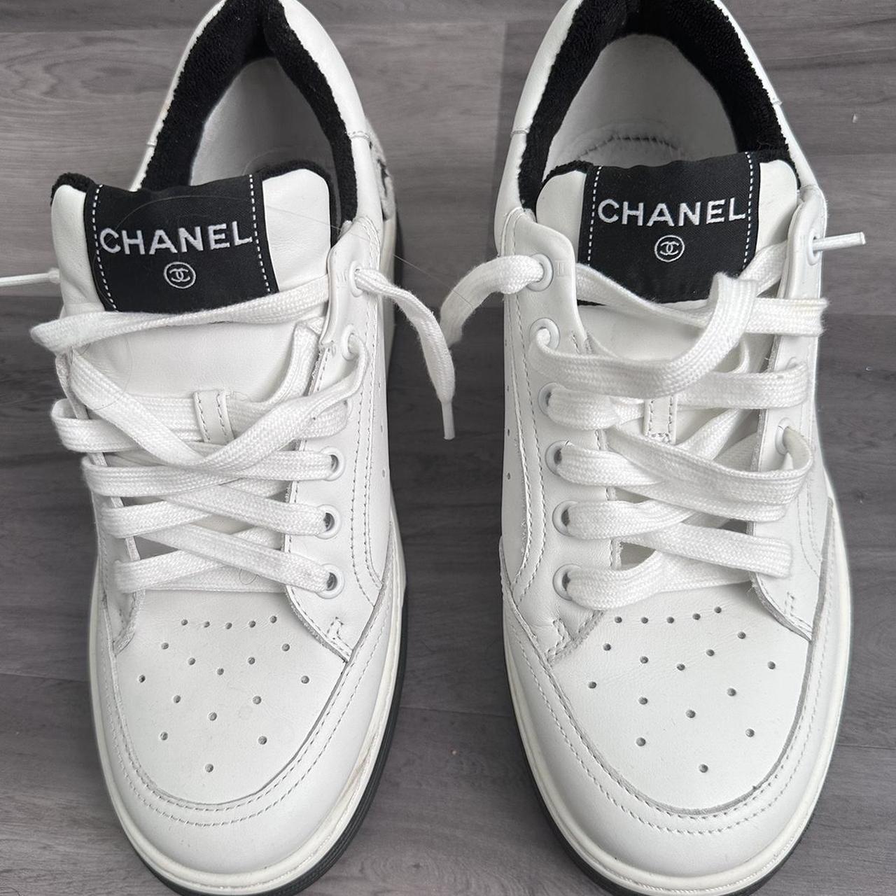 triple white chanel trainers